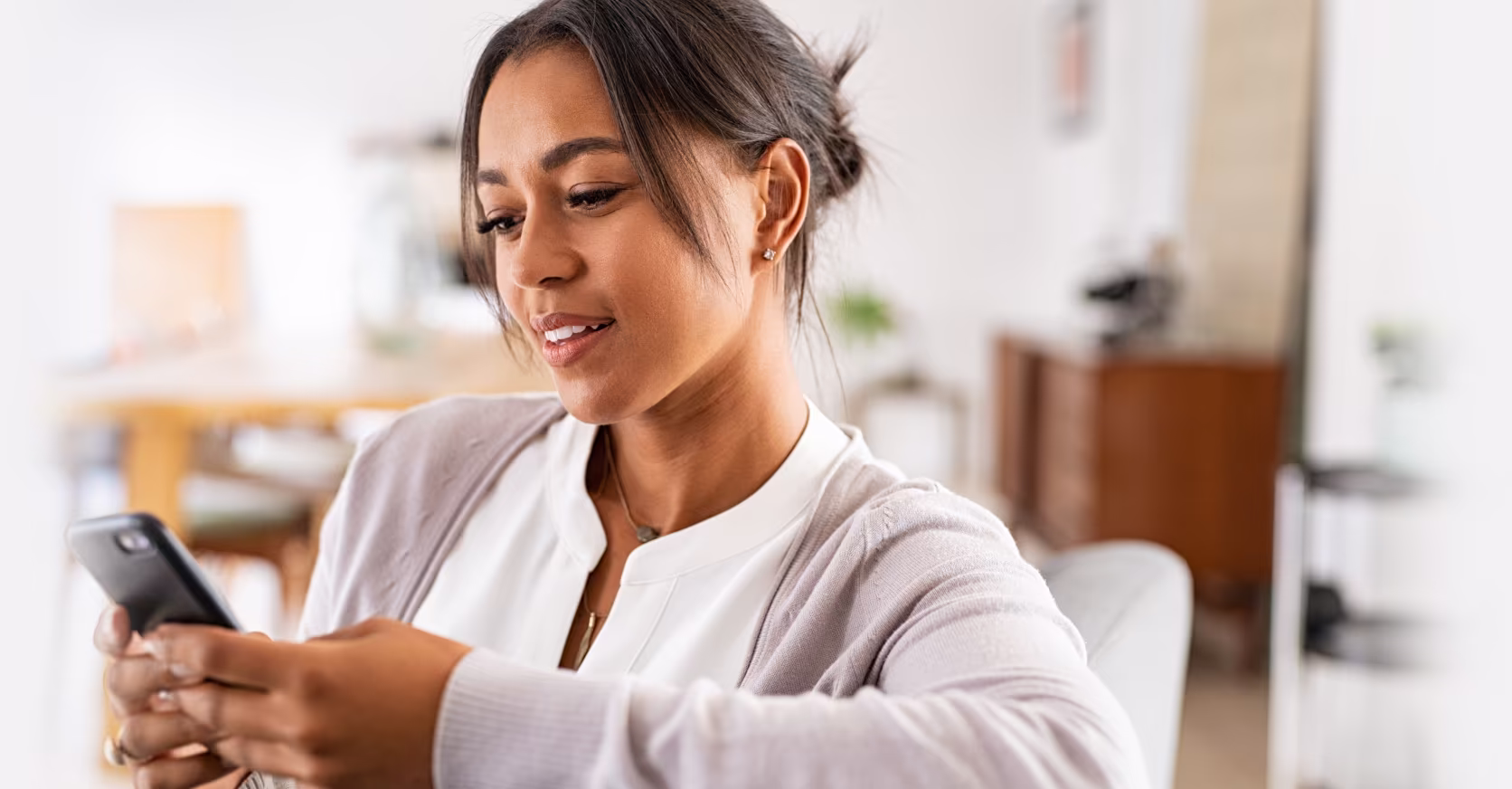 woman looking at phone